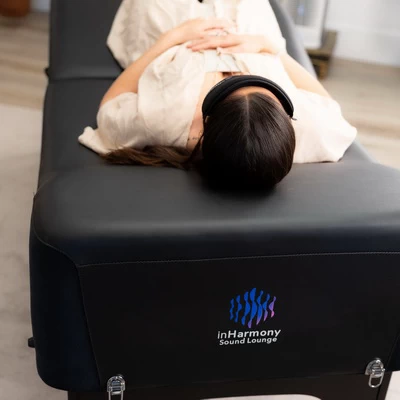 Image of woman on VibroAcoustic bed