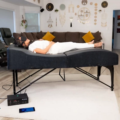 Image of woman on VibroAcoustic bed